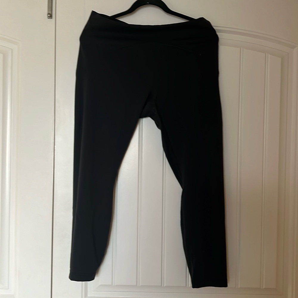 nwt blk lululemon instill high rise tight 25” w/pocket in back waist in size 14.